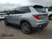 2021 Honda Passport EX-L with VIN 5FNYF8H57MB008619, listed as a Copart auction lot 66881195 with 50,024 mi miles and Salvage title. Bid and sale history available at DreamBid. Image 2.
