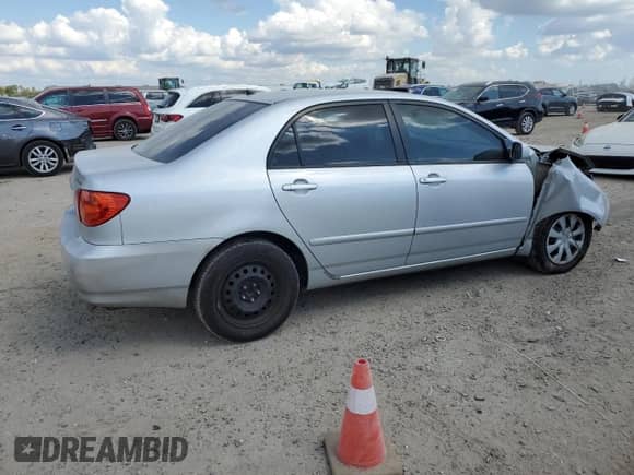 2005 Toyota Corolla LE с VIN 1NXBR32E95Z448810, выставлен на аукционе Copart как лот 87046715 с пробегом 266 757 миль миль и Списание • Salvage title. История ставок и продаж доступна на DreamBid. Изображение 3.