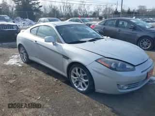 2007 Hyundai Tiburon GT с VIN KMHHN66F97U250757, выставлен на аукционе IAAI как лот 41363768 с пробегом 95 365 миль миль и . История ставок и продаж доступна на DreamBid. Изображение 1.