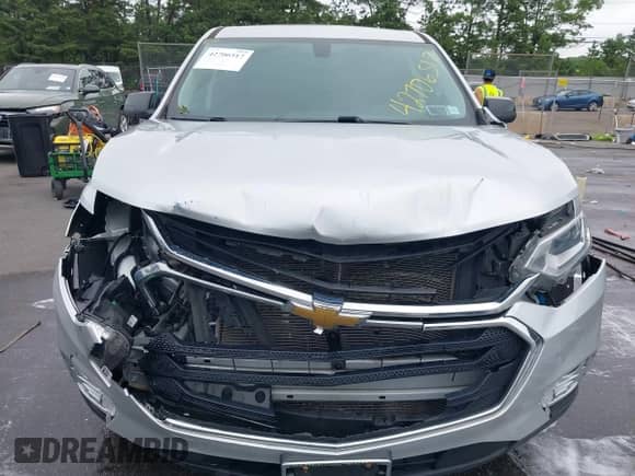 2021 Chevrolet Traverse LS with VIN 1GNEVFKWXMJ119788, listed as a IAAI auction lot 42706517 with 58,471 mi miles and . Bid and sale history available at DreamBid. Image 12.