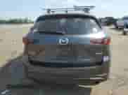 2023 Mazda CX-5 S Select with VIN JM3KFBBM4P0271602, listed as a Copart auction lot 66711345 with 21,328 mi miles and Salvage title. Bid and sale history available at DreamBid. Image 6.