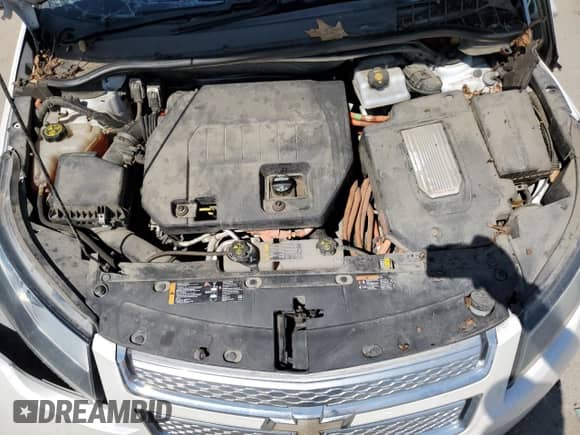 2015 Chevrolet Volt z VIN 1G1RB6E44FU112181, wystawiony jako Copart lot #65770043 z przebiegiem Nie podano mil oraz . Historia ofert i sprzedaży dostępna na DreamBid. Obrazek 11.