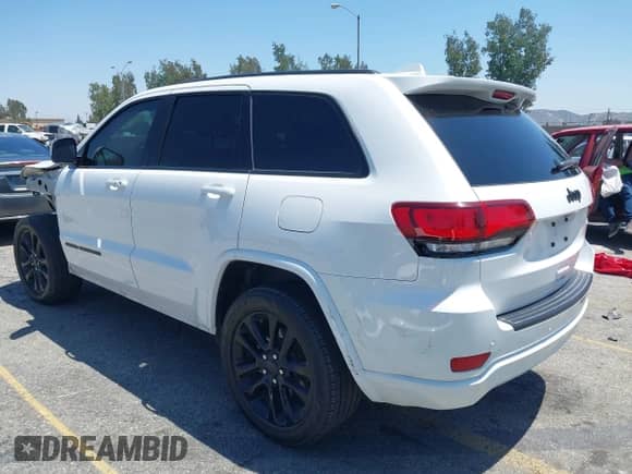 2020 Jeep Grand Cherokee Laredo E with VIN 1C4RJEAG1LC170576, listed as a IAAI auction lot 42283104 with 123,068 mi miles and . Bid and sale history available at DreamBid. Image 3.