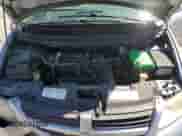 2006 Dodge Caravan SXT z VIN 1D4GP45R16B742495, wystawiony jako Copart lot #85894865 z przebiegiem 237 755 mil mil oraz Szkoda całkowita • Salvage title. Historia ofert i sprzedaży dostępna na DreamBid. Obrazek 12.