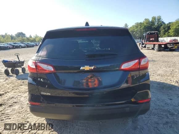 2020 Chevrolet Equinox LS z VIN 2GNAXSEV3L6183770, wystawiony jako Copart lot #71230055 z przebiegiem 83 940 mil mil oraz Szkoda całkowita • Salvage title. Historia ofert i sprzedaży dostępna na DreamBid. Obrazek 6.