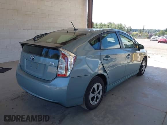 2013 Toyota Prius One with VIN JTDKN3DUXD1726781, listed as a IAAI auction lot 42991533 with 99,185 mi miles and . Bid and sale history available at DreamBid. Image 4.