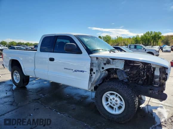 2000 Dodge Dakota Sport с VIN 1B7GG22N9YS703983, выставлен на аукционе Copart как лот 80115605 с пробегом 92 996 миль миль и Списание • Salvage title. История ставок и продаж доступна на DreamBid. Изображение 4.