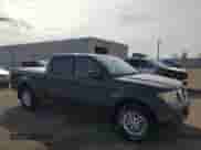 2015 Nissan Frontier SV with VIN 1N6AD0FV9FN700779, listed as a Copart auction lot 81667305 with 129,629 mi miles and Salvage title. Bid and sale history available at DreamBid. Image 4.