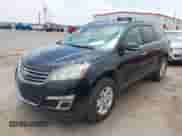 2014 Chevrolet Traverse LT z VIN 1GNKRHKD1EJ318053, wystawiony jako IAAI lot #42562508 z przebiegiem 93 544 mil mil oraz . Historia ofert i sprzedaży dostępna na DreamBid. Obrazek 2.