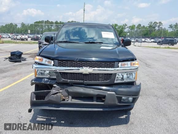 2011 Chevrolet Colorado 1LT z VIN 1GCHTCFE8B8105355, wystawiony jako IAAI lot #42298157 z przebiegiem 213 853 mil mil oraz . Historia ofert i sprzedaży dostępna na DreamBid. Obrazek 12.