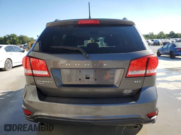 2015 Dodge Journey SXT z VIN 3C4PDDBG0FT569382, wystawiony jako Copart lot #71550295 z przebiegiem 154 117 mil mil oraz Szkoda całkowita • Salvage title. Historia ofert i sprzedaży dostępna na DreamBid. Obrazek 6.