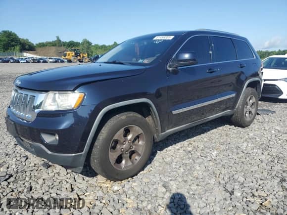 2011 Jeep Grand Cherokee 70th Anniversary z VIN 1J4RR4GG2BC702713, wystawiony jako Copart lot #61486085 z przebiegiem 184 892 mil mil oraz Szkoda całkowita • Salvage title. Historia ofert i sprzedaży dostępna na DreamBid. Obrazek 1.