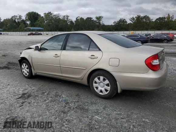 2003 Toyota Camry LE с VIN 4T1BE32K53U715889, выставлен на аукционе Copart как лот 84467025 с пробегом 200 315 миль миль и Списание • Salvage title. История ставок и продаж доступна на DreamBid. Изображение 2.