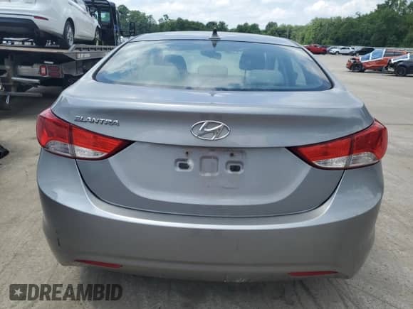 2013 Hyundai Elantra GLS с VIN KMHDH4AE3DU892072, выставлен на аукционе Copart как лот 66383195 с пробегом 138 581 миль миль и Списание • Salvage title. История ставок и продаж доступна на DreamBid. Изображение 6.