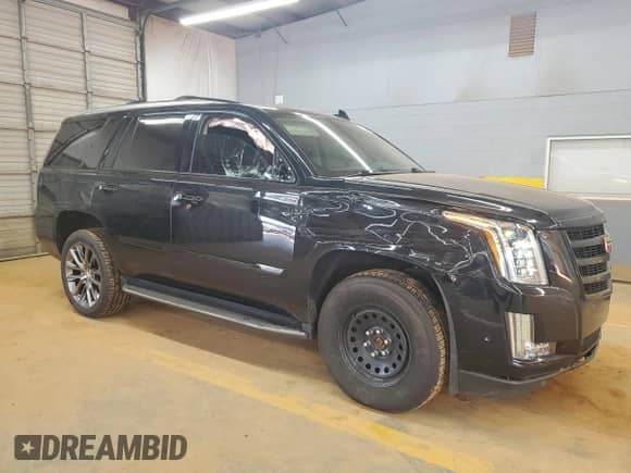 2020 Cadillac Escalade Luxury с VIN 1GYS4BKJ8LR218180, выставлен на аукционе Copart как лот 71680145 с пробегом 108 609 миль миль и Списание • Salvage title. История ставок и продаж доступна на DreamBid. Изображение 4.