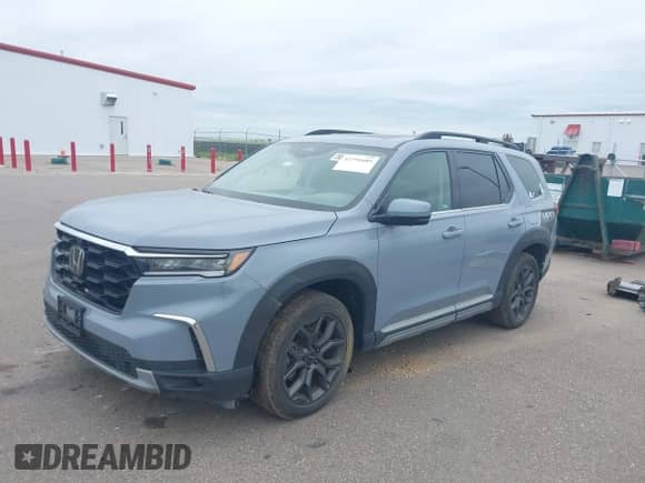 2023 Honda Pilot Elite с VIN 5FNYG1H82PB034130, выставлен на аукционе IAAI как лот 42791889 с пробегом 7 711 миль миль и . История ставок и продаж доступна на DreamBid. Изображение 2.