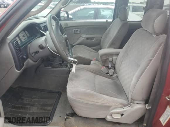 2002 Toyota Tacoma z VIN 5TEWM72N82Z119904, wystawiony jako Copart lot #67544245 z przebiegiem 257 827 mil mil oraz Czysty tytuł • Clean title. Historia ofert i sprzedaży dostępna na DreamBid. Obrazek 7.