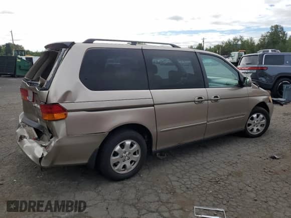 2004 Honda Odyssey EX с VIN 5FNRL18634B118452, выставлен на аукционе Copart как лот 64486285 с пробегом 195 205 миль миль и Списание • Salvage title. История ставок и продаж доступна на DreamBid. Изображение 3.
