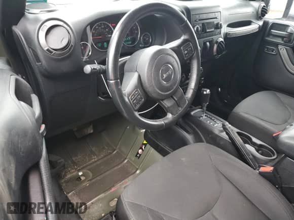 2015 Jeep Wrangler Willys Wheeler z VIN 1C4AJWAG7FL745593, wystawiony jako Copart lot #83771385 z przebiegiem 114 326 mil mil oraz Szkoda całkowita • Salvage title. Historia ofert i sprzedaży dostępna na DreamBid. Obrazek 8.