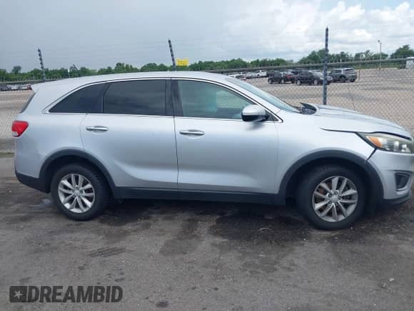 2017 Kia Sorento LX with VIN 5XYPG4A39HG245573, listed as a IAAI auction lot 42442359 with 123,325 mi miles and . Bid and sale history available at DreamBid. Image 13.