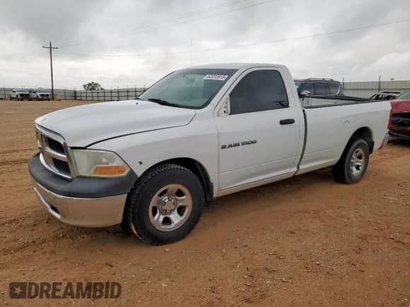2012 Ram 1500 ST z VIN 3C6JD6DP3CG136360, wystawiony jako Copart lot #62033915 z przebiegiem 159 430 mil mil oraz Czysty tytuł • Clean title. Historia ofert i sprzedaży dostępna na DreamBid. Obrazek 1.