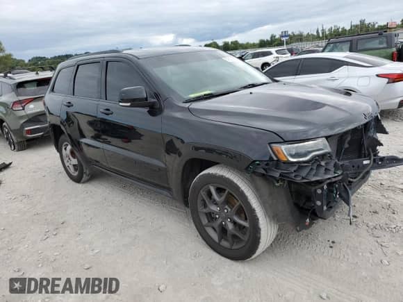 2019 Jeep Grand Cherokee Limited X with VIN 1C4RJFBG3KC846190, listed as a Copart auction lot 69687045 with 130,390 mi miles and Salvage title. Bid and sale history available at DreamBid. Image 4.
