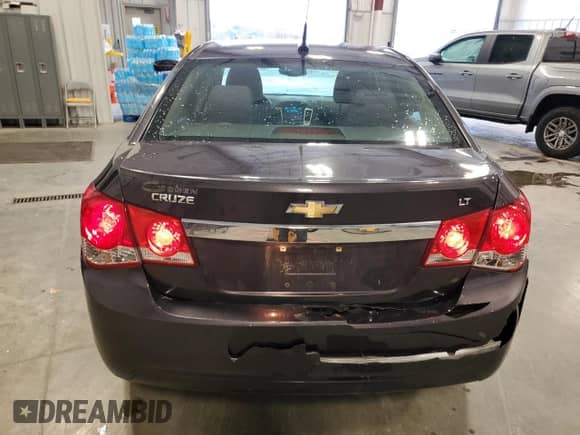 2014 Chevrolet Cruze 1LT z VIN 1G1PC5SB5E7160951, wystawiony jako Copart lot #82628935 z przebiegiem 124 212 mil mil oraz Nie do naprawy • Non repairable. Historia ofert i sprzedaży dostępna na DreamBid. Obrazek 6.