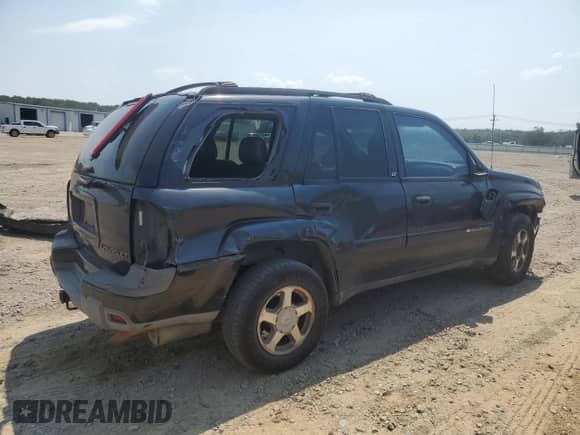 2003 Chevrolet TrailBlazer LT с VIN 1GNDT13S032194640, выставлен на аукционе Copart как лот 69597465 с пробегом 308 008 миль миль и Списание • Salvage title. История ставок и продаж доступна на DreamBid. Изображение 3.
