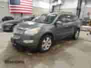 2011 Chevrolet Traverse LTZ z VIN 1GNKVLED5BJ209729, wystawiony jako Copart lot #69379815 z przebiegiem 123 796 mil mil oraz Czysty tytuł • Clean title. Historia ofert i sprzedaży dostępna na DreamBid. Obrazek 1.
