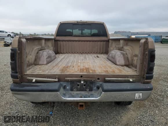 2001 Dodge 2500 with VIN 1B7KF23631J529098, listed as a Copart auction lot 81674595 with 400,626 mi miles and Salvage title. Bid and sale history available at DreamBid. Image 6.