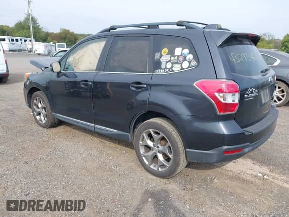 2016 Subaru Forester Touring with VIN JF2SJAVC3GH437843, listed as a IAAI auction lot 43295464 with 204,260 mi miles and . Bid and sale history available at DreamBid. Image 3.