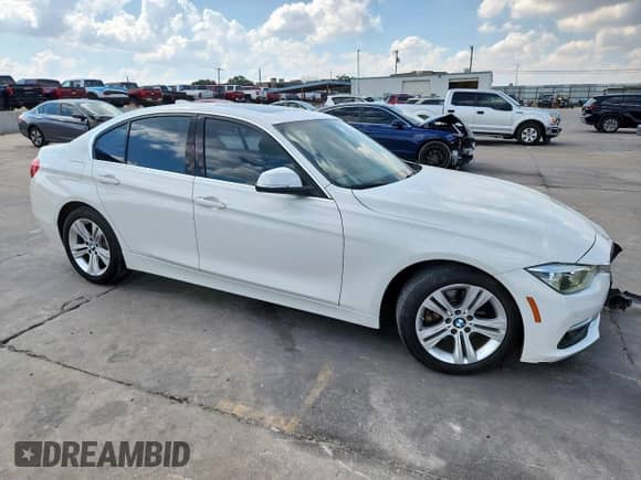 2016 BMW 3 Series 328i with VIN WBA8E9C56GK643660, listed as a Copart auction lot 82228465 with 180,935 mi miles and Salvage title. Bid and sale history available at DreamBid. Image 4.