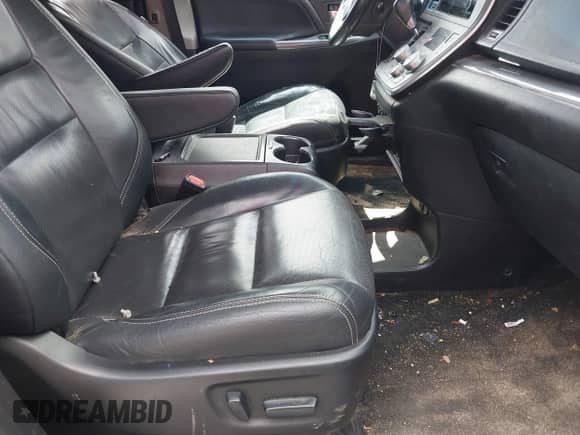 2015 Toyota Sienna SE with VIN 5TDXK3DC9FS598741, listed as a IAAI auction lot 42351368 with 150,054 mi miles and . Bid and sale history available at DreamBid. Image 5.