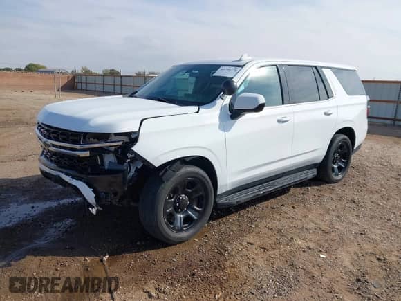 2021 Chevrolet Tahoe Commercial with VIN 1GNSKLED2MR374859, listed as a IAAI auction lot 40736376 with 83,417 mi miles and . Bid and sale history available at DreamBid. Image 18.