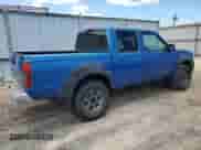 2001 Nissan Frontier SE with VIN 1N6ED27T91C390230, listed as a Copart auction lot 58844905 with 157,883 mi miles and Salvage title. Bid and sale history available at DreamBid. Image 3.