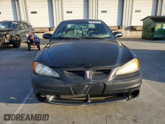 2004 Pontiac Grand Am GT с VIN 1G2NW52E24M637369, выставлен на аукционе Copart как лот 55379165 с пробегом 211 637 миль миль и Списание • Salvage title. История ставок и продаж доступна на DreamBid. Изображение 5.