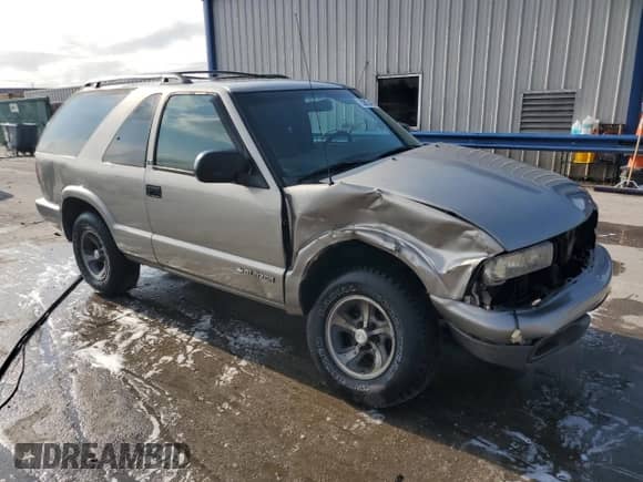 2002 Chevrolet Blazer LS с VIN 1GNCS18W52K214535, выставлен на аукционе Copart как лот 55815465 с пробегом 160 614 миль миль и Списание • Salvage title. История ставок и продаж доступна на DreamBid. Изображение 4.