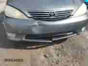 2006 Toyota Camry STD with VIN 4T1BE30K96U699347, listed as a IAAI auction lot 42737869 with 291,128 mi miles and . Bid and sale history available at DreamBid. Image 12.