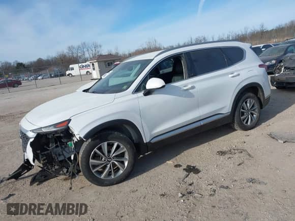 2019 Hyundai Santa Fe SEL with VIN 5NMS3CAD4KH018717, listed as a IAAI auction lot 41240409 with 116,871 mi miles and . Bid and sale history available at DreamBid. Image 2.