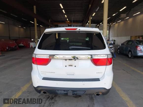 2013 Dodge Durango Crew with VIN 1C4SDJDT9DC697017, listed as a IAAI auction lot 42918013 with 153,270 mi miles and . Bid and sale history available at DreamBid. Image 16.