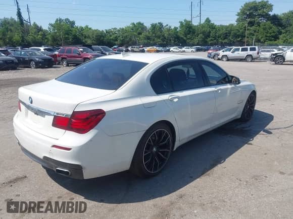 2013 BMW 7 Series 750Li xDrive with VIN WBAYF8C51DD139735, listed as a IAAI auction lot 42590928 with 118,984 mi miles and . Bid and sale history available at DreamBid. Image 6.