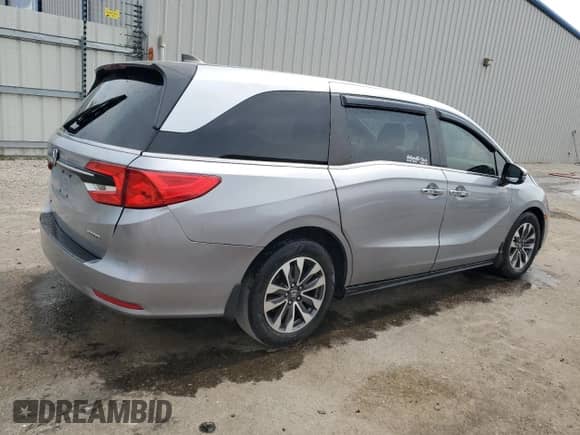 2021 Honda Odyssey EX-L with VIN 5FNRL6H74MB011108, listed as a Copart auction lot 70639845 with 154,827 mi miles and Salvage title. Bid and sale history available at DreamBid. Image 3.