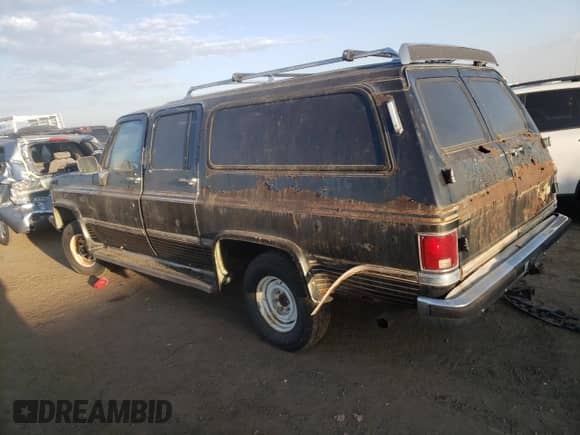 1988 Chevrolet Suburban с VIN 1GBEV16K7JF127952, выставлен на аукционе Copart как лот 76145144 с пробегом 942 545 миль миль и Чистый • Clean title. История ставок и продаж доступна на DreamBid. Изображение 2.