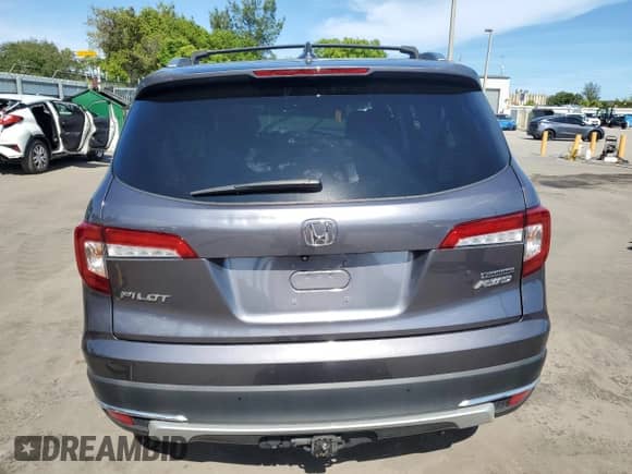 2021 Honda Pilot Touring 8-Passenger z VIN 5FNYF6H94MB034392, wystawiony jako Copart lot #68621825 z przebiegiem Nie podano mil oraz Nie do naprawy • Non repairable. Historia ofert i sprzedaży dostępna na DreamBid. Obrazek 6.