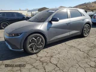 2022 Hyundai Ioniq 5 SEL с VIN KM8KN4AE9NU082513, выставлен на аукционе Copart как лот 63118395 с пробегом 53 454 миль миль и Списание • Salvage title. История ставок и продаж доступна на DreamBid. Изображение 1.