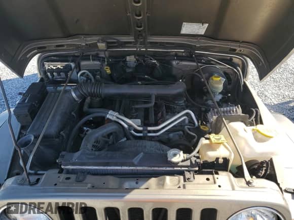 2004 Jeep Wrangler Sahara с VIN 1J4FA59S34P742442, выставлен на аукционе Copart как лот 51053095 с пробегом 161 263 миль миль и Списание • Salvage title. История ставок и продаж доступна на DreamBid. Изображение 13.