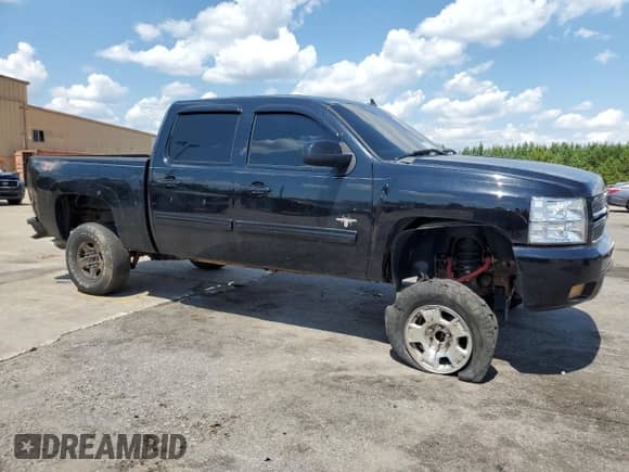 2013 Chevrolet Silverado 1500 LT с VIN 3GCPKSE77DG268295, выставлен на аукционе Copart как лот 70385215 с пробегом 167 473 миль миль и Списание • Salvage title. История ставок и продаж доступна на DreamBid. Изображение 4.