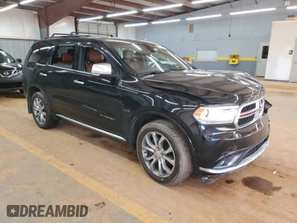 2018 Dodge Durango Citadel Anodized Platinum with VIN 1C4SDJET7JC302357, listed as a Copart auction lot 82209205 with 104,428 mi miles and Salvage title. Bid and sale history available at DreamBid. Image 4.