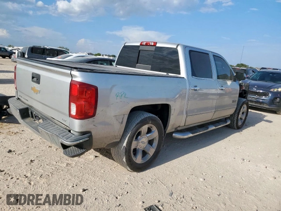 2018 Chevrolet Silverado 1500 LTZ z VIN 3GCPCSECXJG358630, wystawiony jako Copart lot #70010705 z przebiegiem 121 259 mil mil oraz Szkoda całkowita • Salvage title. Historia ofert i sprzedaży dostępna na DreamBid. Obrazek 3.