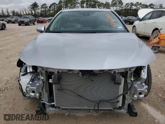 2023 Toyota Camry SE with VIN 4T1G11AK4PU809954, listed as a Copart auction lot 71636965 with 12,236 mi miles and Salvage title. Bid and sale history available at DreamBid. Image 5.